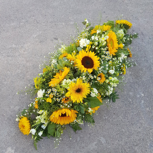 Beaming Sun Casket SprayFuneral Tribute