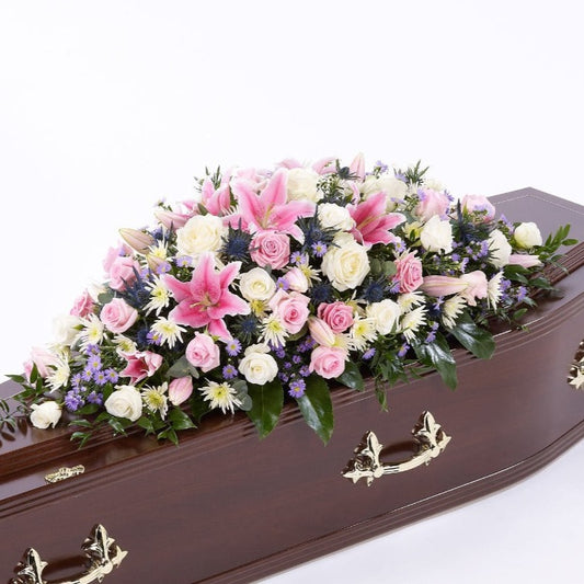 Rose and Eryngium Casket Spray Funeral Tribute